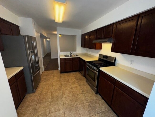 Building Photo - Charming 2-Bedroom Condo in a Peaceful, Tree-Lined Community – Minutes from Uptown Charlotte