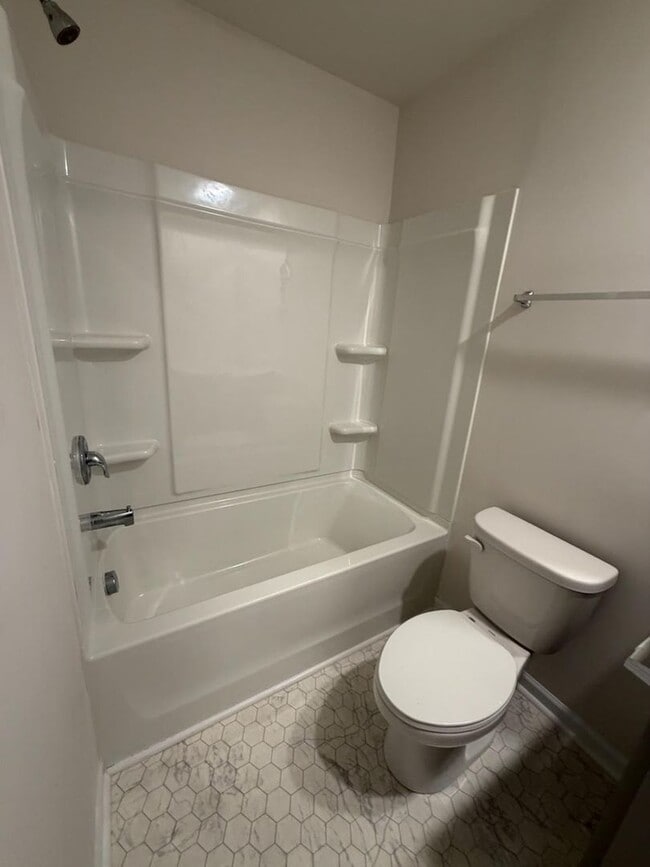 Building Photo - Brand new 3 bedroom townhome available for immediate move in!
