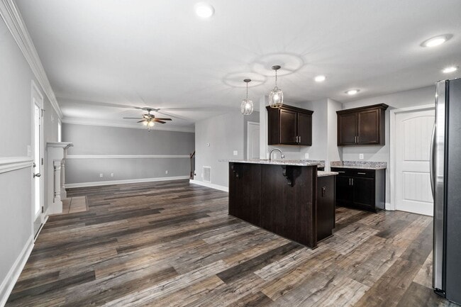 Building Photo - Pet Friendly Three Bedroom with Bonus!