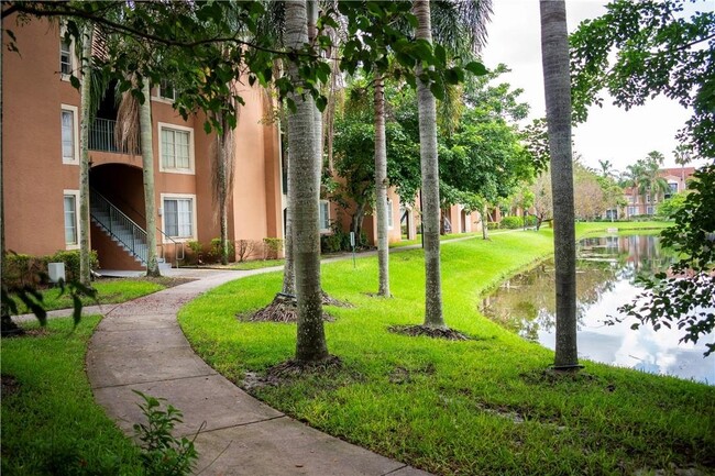 Building Photo - 4828 U.S. 441 Apt #8102, Coconut Creek, FL...