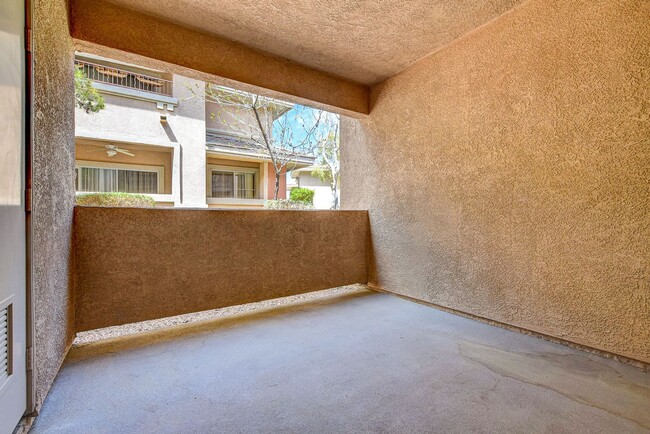 Building Photo - Upgraded First-Floor Condo in a Gated Summ...