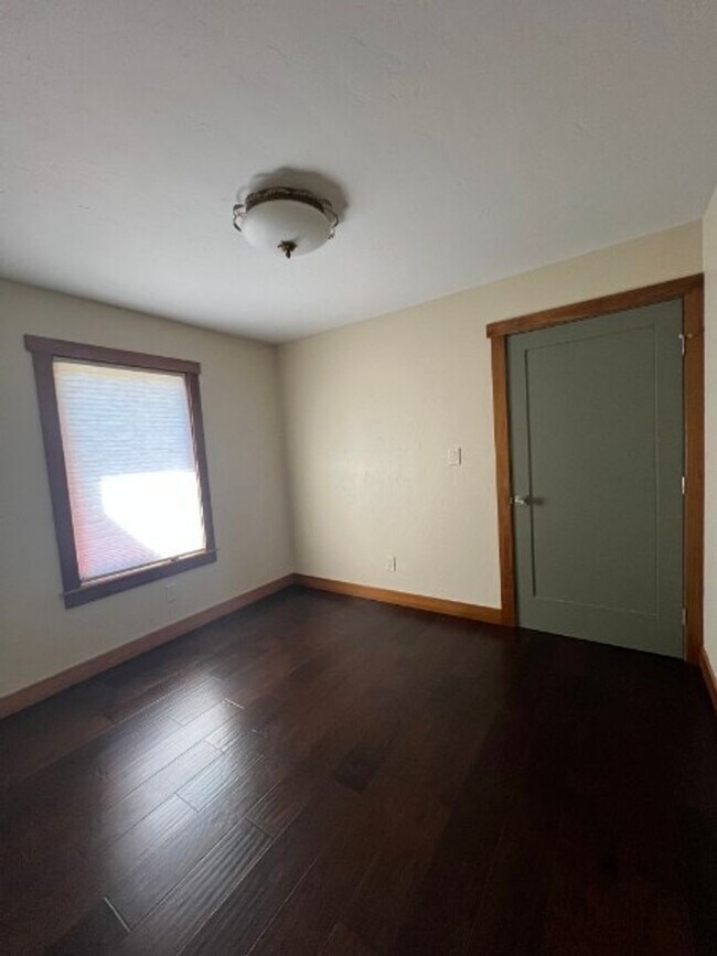 Building Photo - Artisan-Built Custom Cottage Retreat | Private Yard, Garage & EV Charging Ready