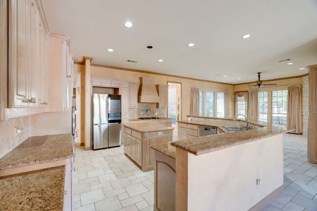 Building Photo - "Stately Gated 5-Bedroom Estate With Pool, Custom Details & Abundant Living Space!"