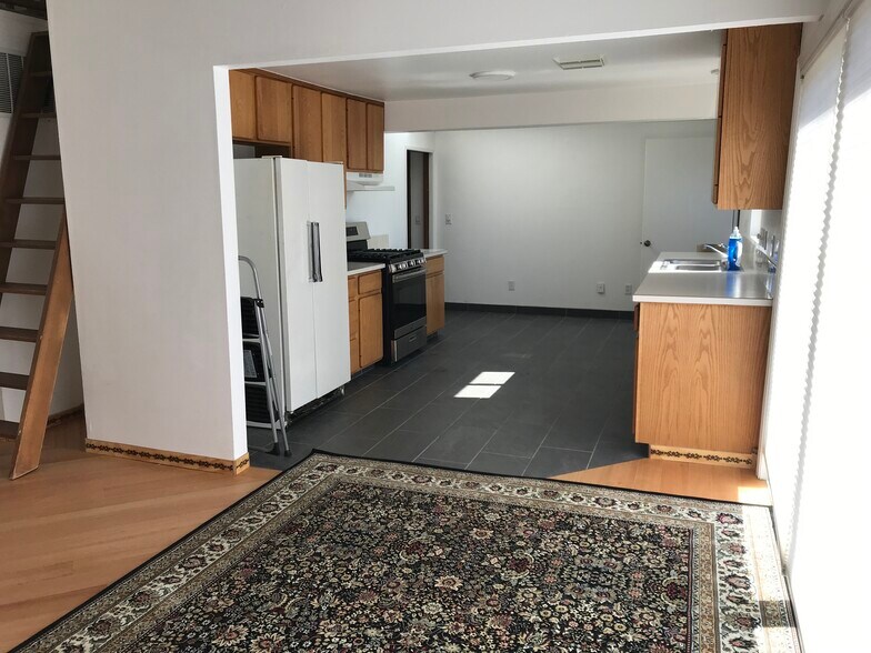 House: kitchen with new tile floor - 1609 7th Ave SE