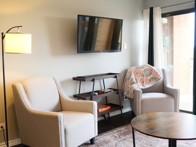 Cozy Chairs + TV - 400 S Lafayette St