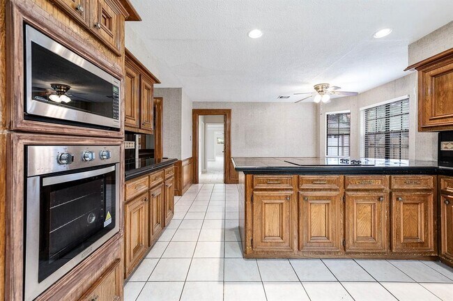 Building Photo - 12203 Normont Dr