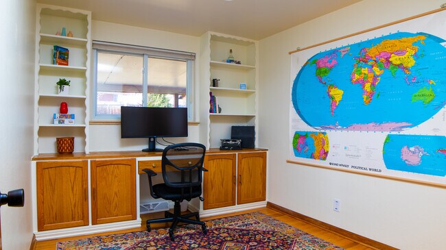 There is a queen sized bed in this room as well. - 6185 W 61st Ave