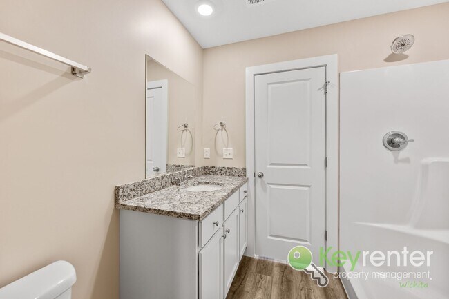 Building Photo - E 69th Ct N Duplex