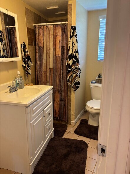 Bathroom with shower. - 5202 E McElroy Rd