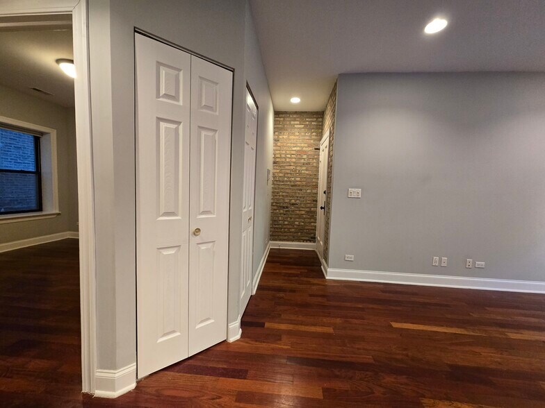 Entryway, hallway storage, bedroom. - 1360 W Estes Ave