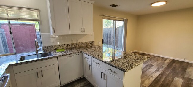 Building Photo - Remodeled Large 4 Bedroom 2 Bath Condo  in...