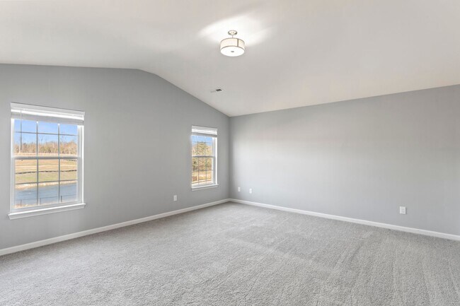 Building Photo - Stunning 4-Bedroom Home with Serene Pond Views