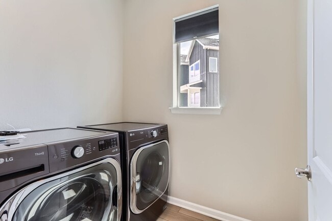 Building Photo - Brand New Build Three-Story Townhome in Er...