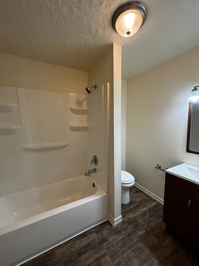 Building Photo - Quaint home with fully fenced yard and updates