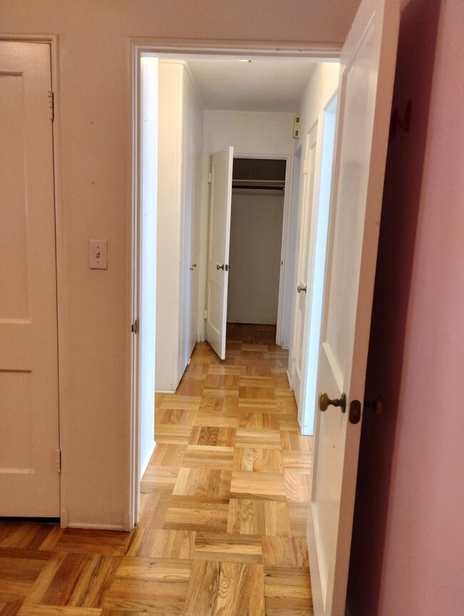 looking into hallway from small bedroom - 5273 Village Grn