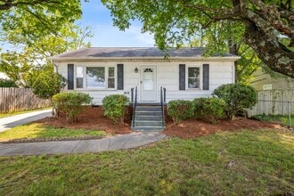 Building Photo - Updated Home with Hardwood Floors, LR & De...