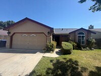 Building Photo - Single story near freeway access and major shopping!