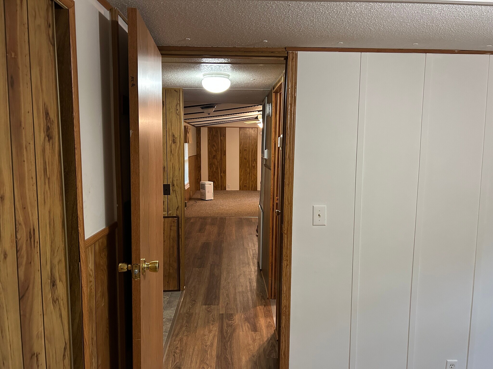 View from bedroom #2 off of laundry area and bathroom - 10975 E US Highway 64