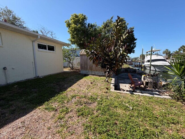 Building Photo - "Waterfront Home with Dock! 3-Bedroom Oasis with 2 Baths and 1,800 Sq Ft of Comfort in Hudson, FL!"