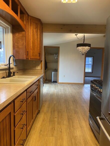 Galley style kitchen looking to dining area and pantry - 855 Wabash Ave S