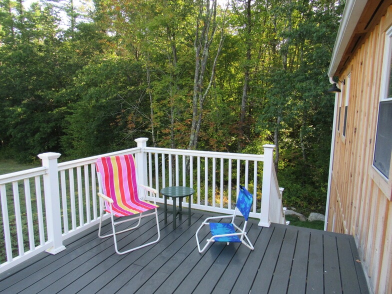 Enjoy the elevated deck and watch for woodland critters - 57 River Rd