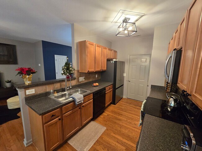 Building Photo - Beautiful Apex Townhome with Greenway Access & Community Amenities