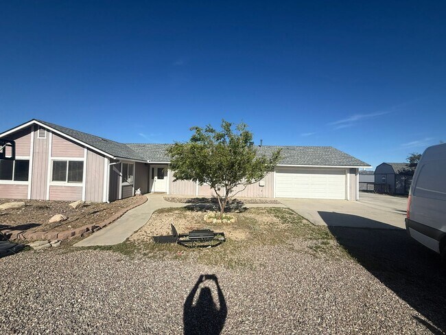 Building Photo - 4BR/2BA HOME w/ attached garage, usable land, fenced in back yard in CAMPO available!