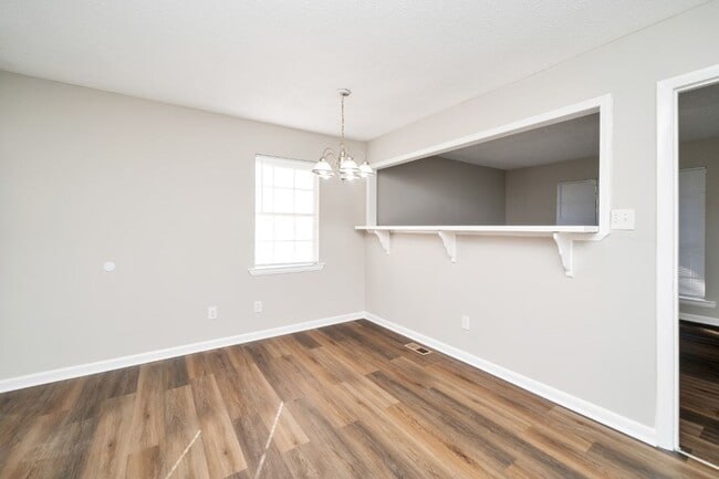 Building Photo - Newly Renovated 4-Bedroom Brick Beauty in ...