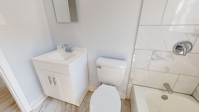 Building Photo - Two bedroom apartment for $1199 per month ~5 minutes from the Airport in a quaint and quiet commu...