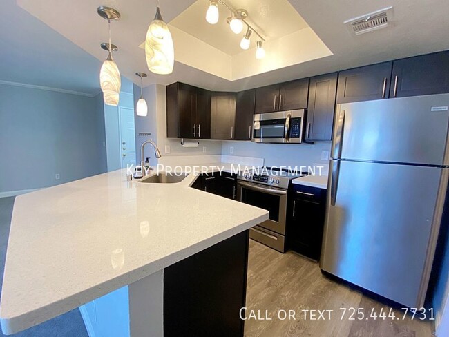 Building Photo - BEAUTIFULLY UPGRADED 2BD 2BA CONDO IN SUMM...