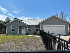 Building Photo - New home in Pine Knoll Shores
