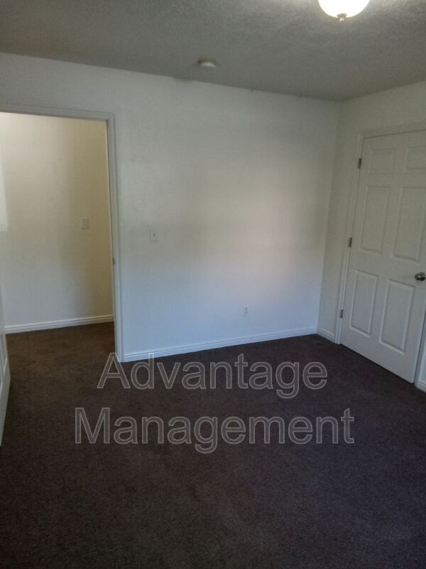Building Photo - 8083 N Ridge Loop E