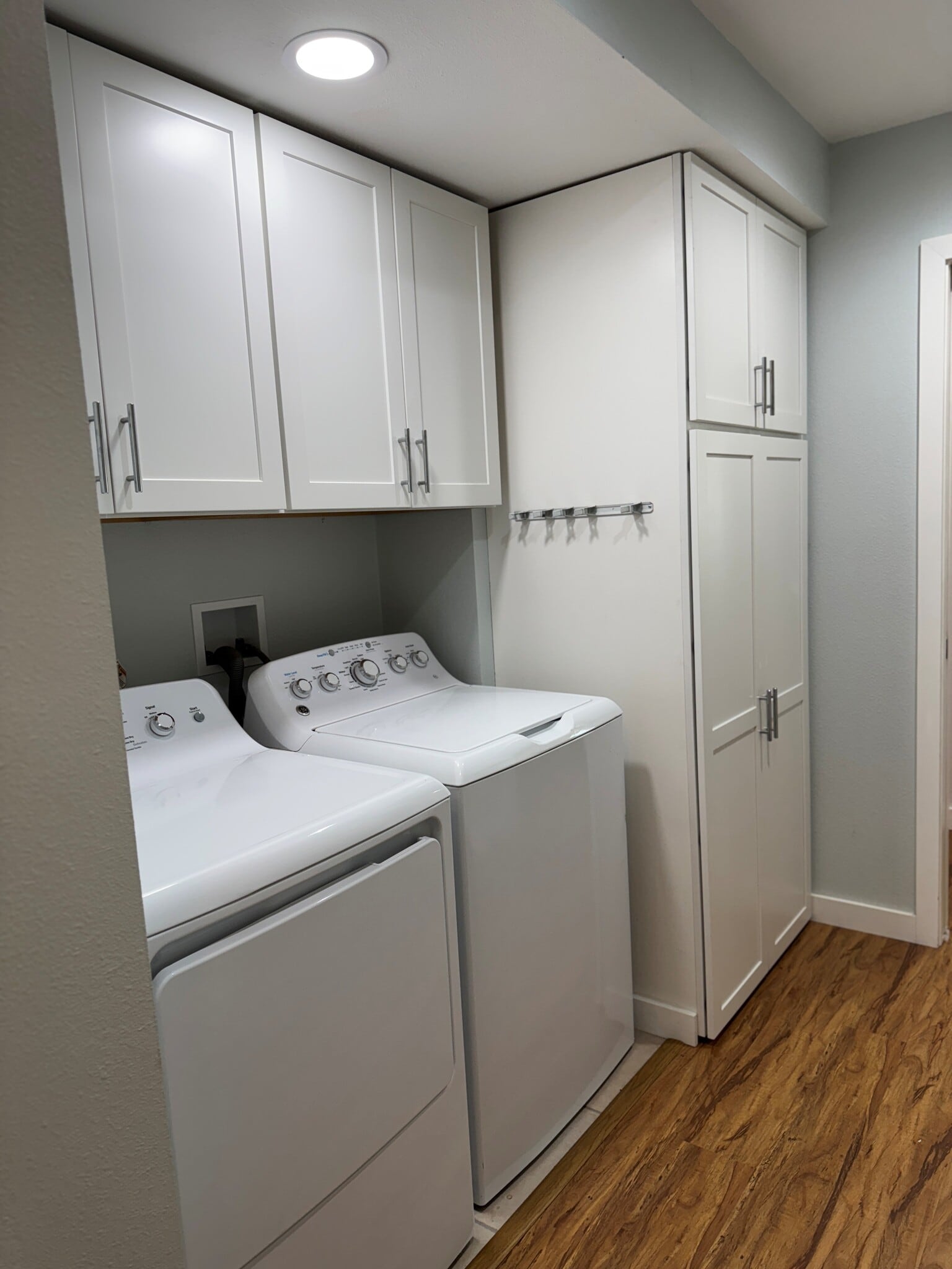 Laundry room with storage. - 22471 Loch Lomond Dr