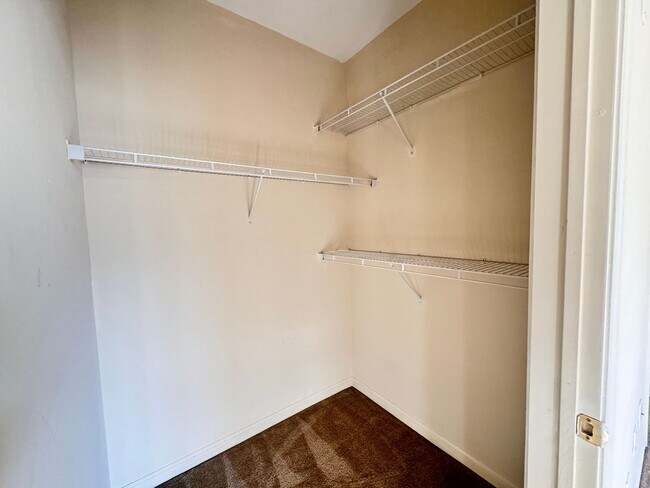 Building Photo - Home Near UNR: Spacious 4BR/4BA with Gated Access and Balcony!