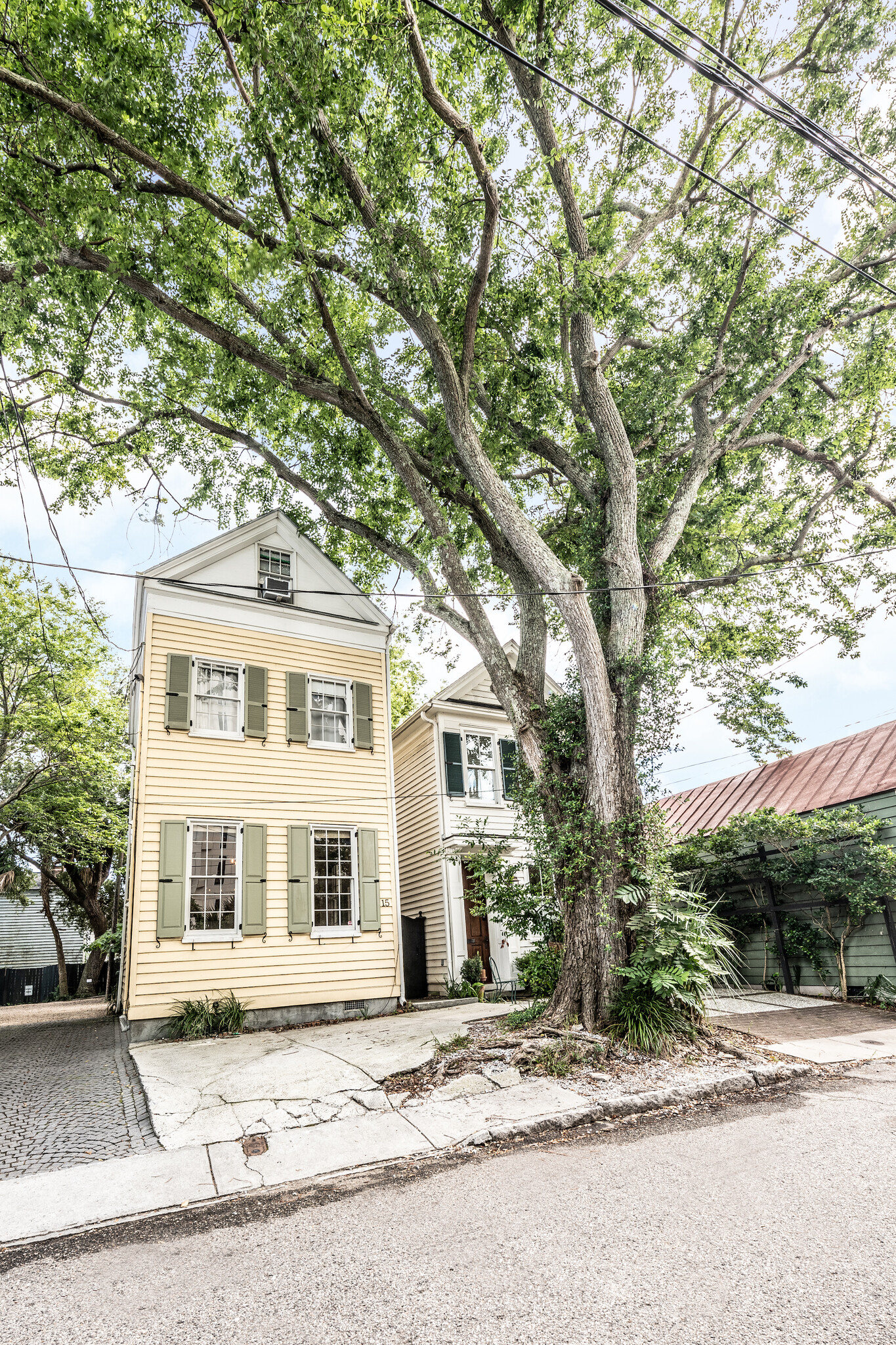 Exterior of home with off-street parking for one vehicle in front - 15 West St