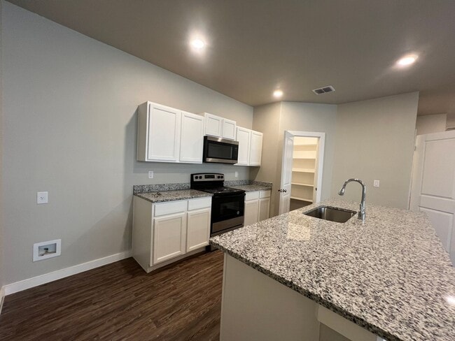 Building Photo - Stylish and Modern 3-Bedroom Duplex for Re...
