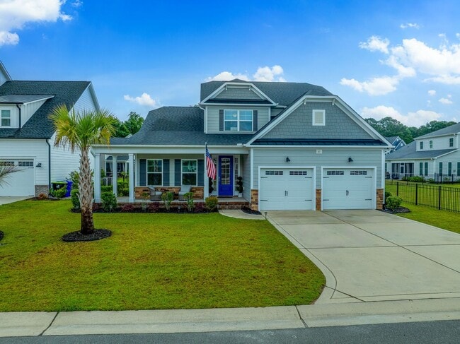 Building Photo - Stunning 4 bedroom 2.5 bath home located in Hampstead Wyndwater Community