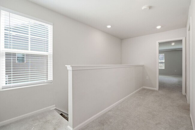 Building Photo - Upgraded 3BR Townhome in Wake Forest | Open Layout, Garage & Resort-Style Amenities