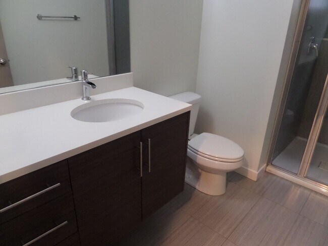 Building Photo - Immaculate and LARGE 4-Bedroom Home in Unb...