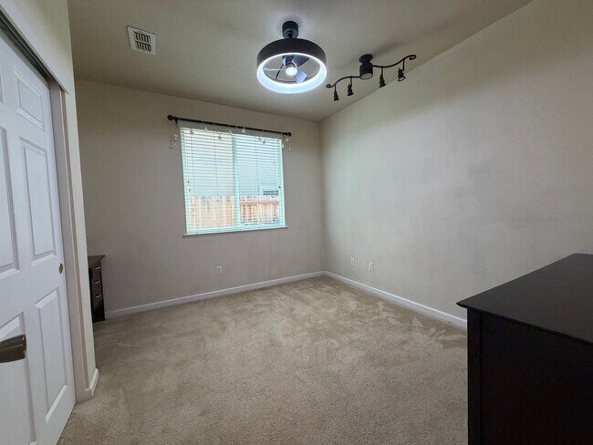 Building Photo - Spacious 4-Bedroom Elk Grove Home with Updated Kitchen, Quartz Countertops! VIEW TODAY!