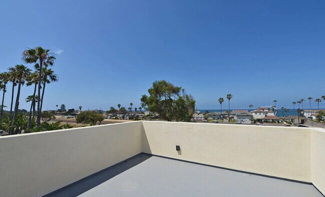 Building Photo - Ultimate Beach House! 3 Bed/3 Bath with Ocean Views from Every Floor, Panoramic Rooftop Deck, Dua...