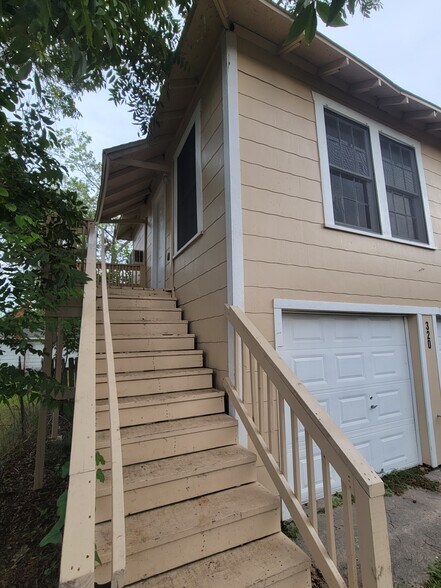 Head upstairs - 320 S Ashbel St
