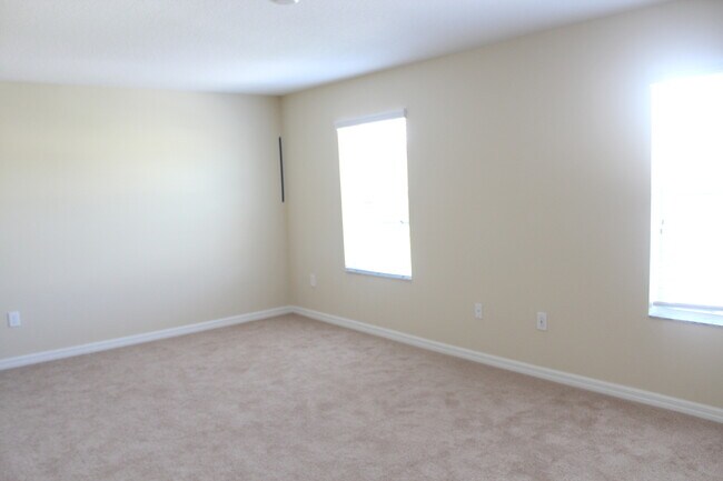 Building Photo - Spacious 3BR Lake Nona Townhome Near Medical City | 2,319 Sq Ft | 2-Car Garage