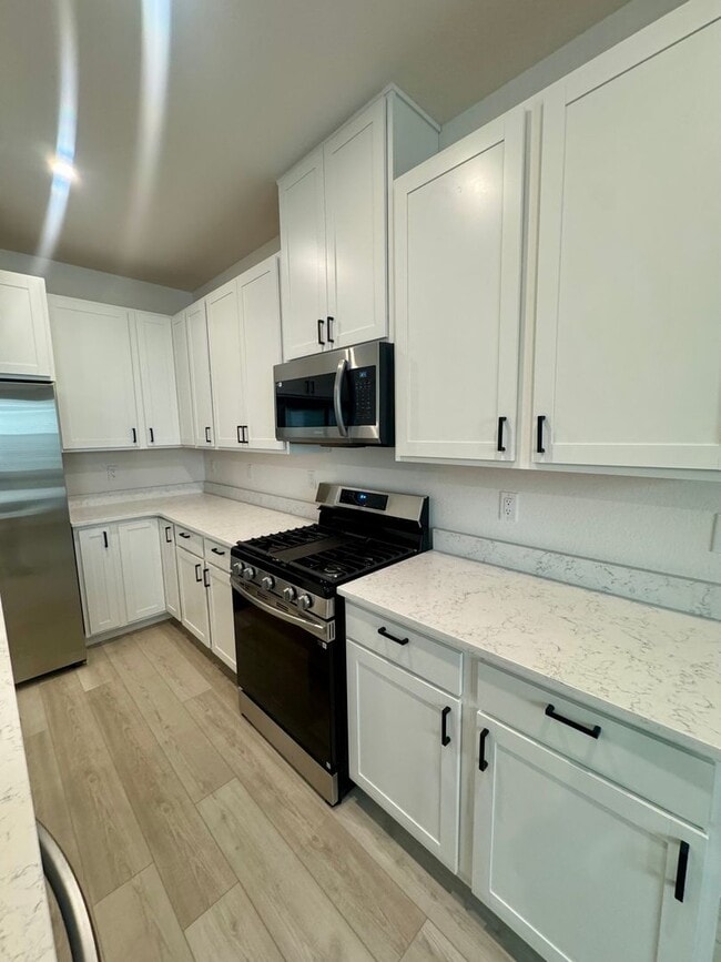 Building Photo - NEW construction 3 bedroom luxury townhome