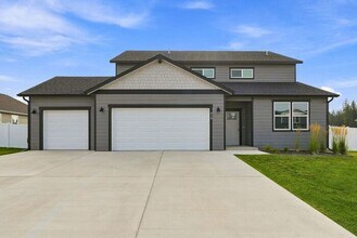 Building Photo - Spacious 5-Bedroom with Loft with 3-Car Garage