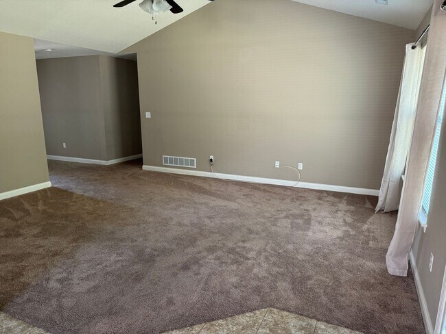Building Photo - Charming Three Bedroom Home