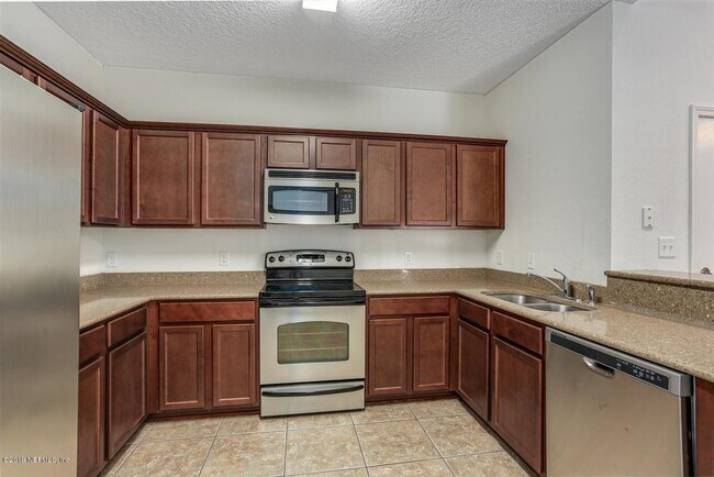 Building Photo - 4908 Key Lime Dr