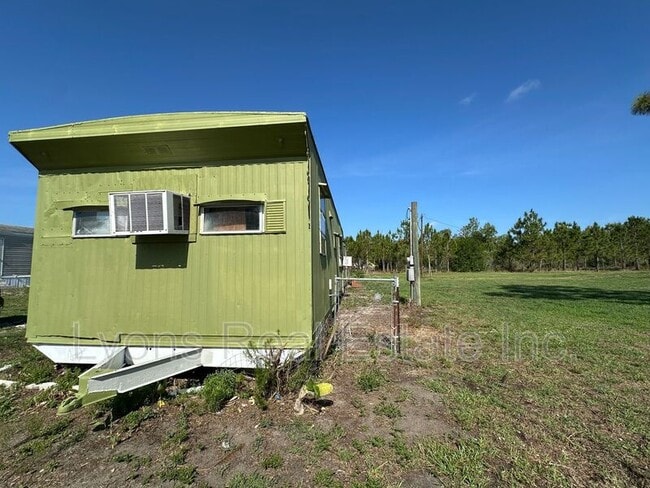 Building Photo - 8086 Heck Dr