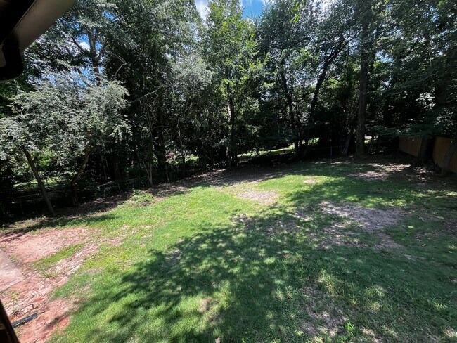 Building Photo - Must See the Sunroom off the Primary Bedroom!
