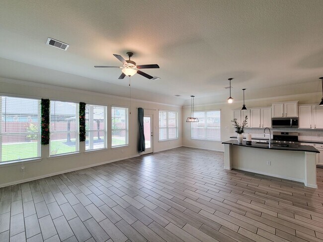 Building Photo - This thoughtfully designed home boasts 4 spacious bedrooms (2 down) and 3.5 baths, providing ampl...